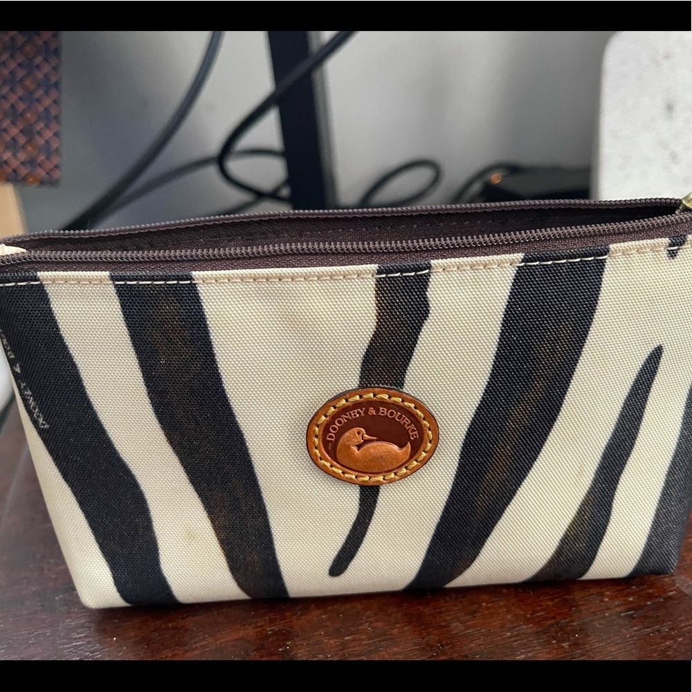 Dooney and Bourke make up pouch.  Zebra print.